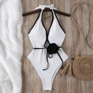 Maillot de bain gainant sculptant blanc à fleur noire